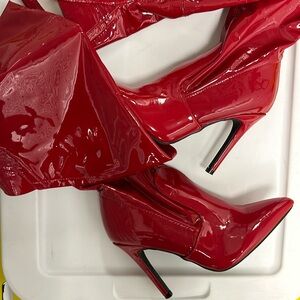 Red patient leather thigh high boots